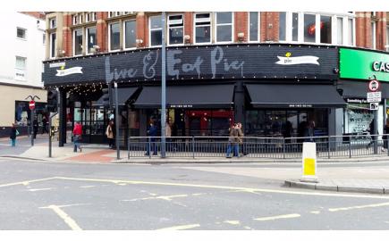 Traditional awning styling for contemporary pie and mash shop